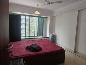 Bedroom in 3 BHK Apartment at Dynamix Shagun Mall Tower, Malad East – for Rent