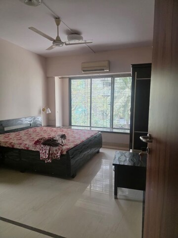 Bedroom in 3 BHK Apartment at Dynamix Shagun Mall Tower, Malad East – for Rent