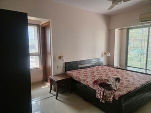 Bedroom in 3 BHK Apartment at Dynamix Shagun Mall Tower, Malad East – for Rent