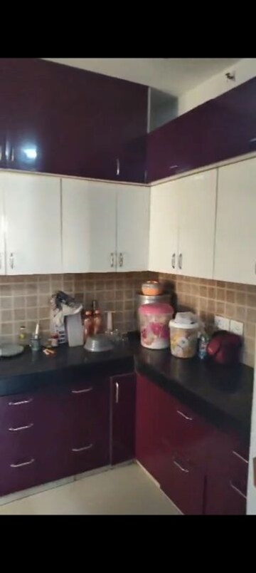 Kitchen in 2 BHK Apartment at Mahagun Mywoods, Sector 16c Greater Noida – for Rent