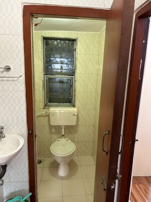 Bathroom in 2 BHK Apartment at Silver Sand CHS, Andheri West – for Sale