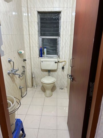 Bathroom in 2 BHK Apartment at Silver Sand CHS, Andheri West – for Sale