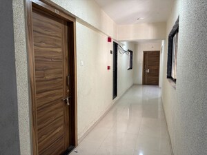 Building Lobby in 1 BHK Apartment at K M Horizon Palms, Owale – for Rent