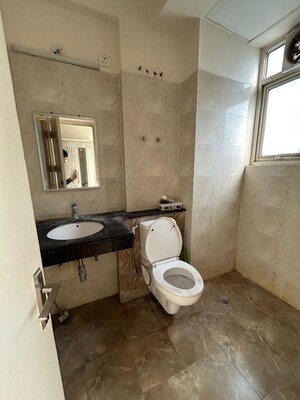 Bathroom in 3 BHK Builder Floor at Wave Executive Floors, Wave City – for Sale