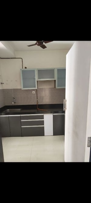 Kitchen in 2 BHK Apartment at Acme Oasis, Kandivali East – for Rent