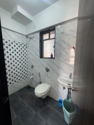 Bathroom in 1 BHK Apartment at UK Iridium, Kandivali East – for Rent