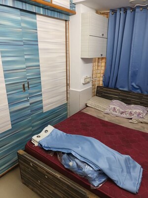 Bedroom in 1 BHK Apartment at Chandiwala Pearl Harmony, Andheri West – for Rent