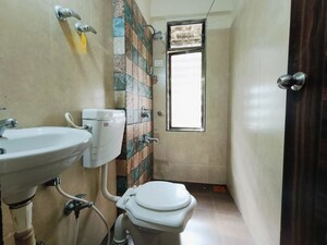 Bathroom in 2 BHK Apartment at Ace Courtyard, Ghodbunder Road – for Rent