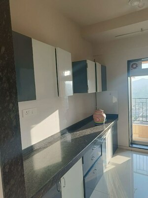 Kitchen in 2 BHK Apartment at Rustomjee Urbania Azziano, Thane West – for Rent