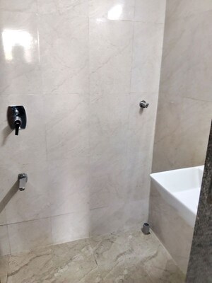 Bathroom in 1 BHK Apartment at Dimple 19 North, Kandivali West – for Rent