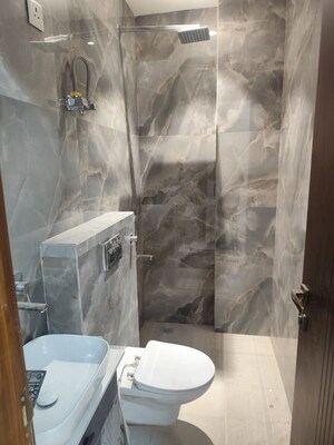 Bathroom in 3 BHK Builder Floor at Tagore Garden – for Sale