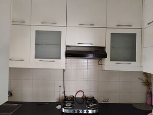 Kitchen in 2 BHK Apartment at DB Parkwoods, Kasarvadavali – for Rent
