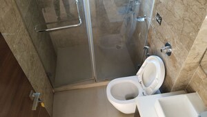 Bathroom in 4 BHK Apartment at Dynamix Woodlands Apartment, Malad East – for Rent