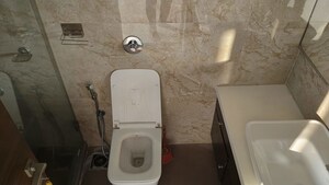 Bathroom in 4 BHK Apartment at Dynamix Woodlands Apartment, Malad East – for Rent