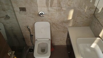 Bathroom in 4 BHK Apartment at Dynamix Woodlands Apartment, Malad East – for Rent