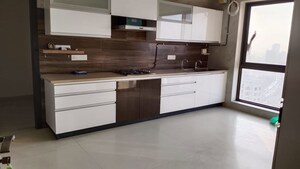Kitchen in 4 BHK Apartment at Dynamix Woodlands Apartment, Malad East – for Rent