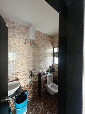 Bathroom in 2 BHK Apartment at Solitaire Residency, Pimple Saudagar – for Rent