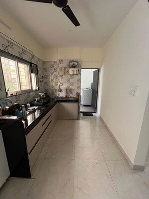 Kitchen in 2 BHK Apartment at Solitaire Residency, Pimple Saudagar – for Rent
