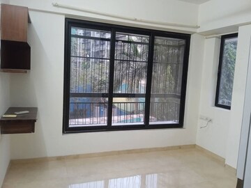 Room in 1 BHK Apartment at Satellite Royale, Goregaon East – for Rent