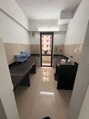 Kitchen in 1 BHK Apartment at Lodha Lakeshore Greens, Dombivli East – for Rent