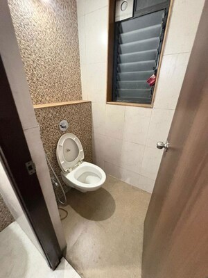 Bathroom in 1 BHK Apartment at Lodha Lakeshore Greens, Dombivli East – for Rent