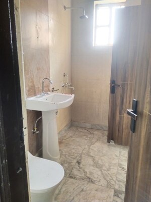 Bathroom in 2 BHK Builder Floor at Srishti Greenfield Homes, Green Fields Colony – for Rent