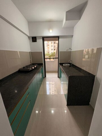 Kitchen in 1 BHK Apartment at Lodha Palava City Lakeshore Greens, Dombivli East – for Rent