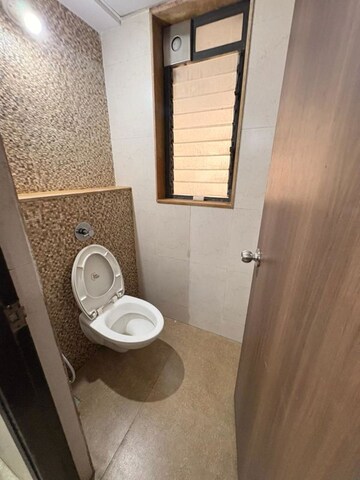 Bathroom in 1 BHK Apartment at Lodha Palava City Lakeshore Greens, Dombivli East – for Rent