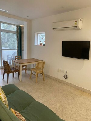 Living Room in 1 BHK Apartment at The Retreat Gurgaon, Sector 41 – for Rent