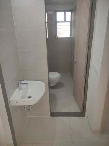 Bathroom in 2.5 BHK Apartment at Magarpatta Riverview City Hornbill Heights, Loni Kalbhor – for Sale