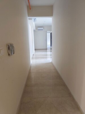 Building Lobby in 2 BHK Apartment at Kalpataru Mugnus, Bandra East – for Rent