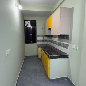 Kitchen in 2 BHK Builder Floor at Palm Residency Chhatarpur, Rajpur Khurd Extension – for Rent