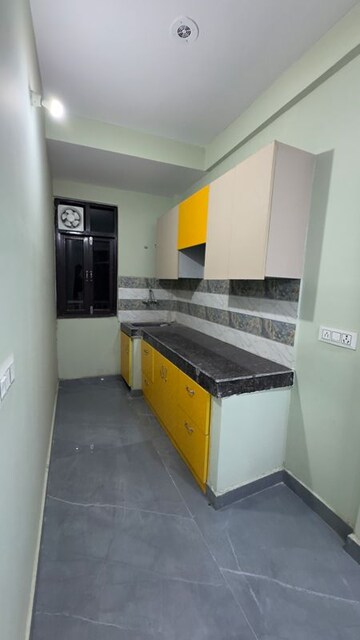 Kitchen in 2 BHK Builder Floor at Palm Residency Chhatarpur, Rajpur Khurd Extension – for Rent