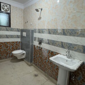 Bathroom in 2 BHK Builder Floor at Palm Residency Chhatarpur, Rajpur Khurd Extension – for Rent