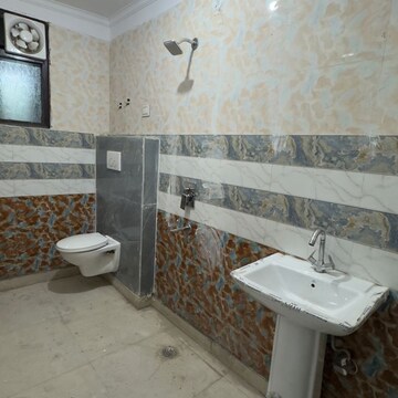 Bathroom in 2 BHK Builder Floor at Palm Residency Chhatarpur, Rajpur Khurd Extension – for Rent