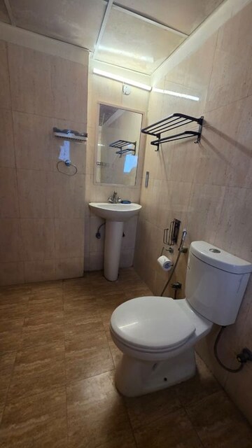 Bathroom in 1 RK Apartment at Urbtech Xaviers, Sector 168 – for Rent