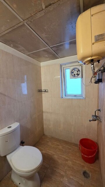 Bathroom in 1 RK Apartment at Urbtech Xaviers, Sector 168 – for Rent