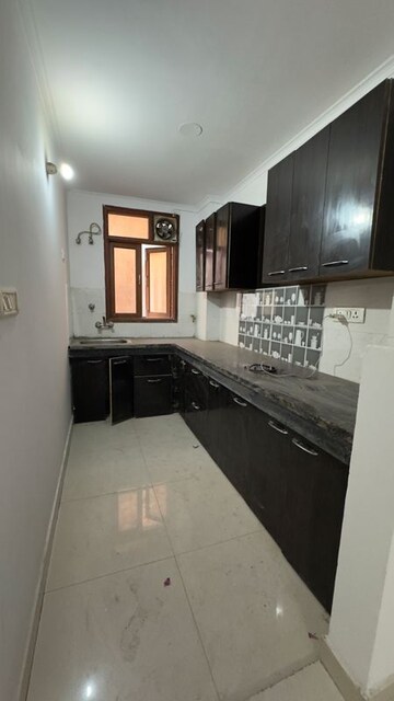 Kitchen in 2 BHK Apartment at Palm Residency Chhatarpur, Rajpur Khurd Extension – for Rent