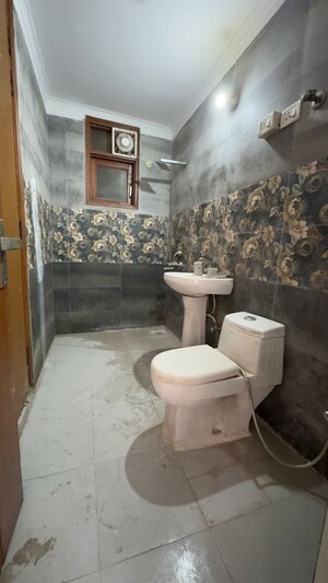 Bathroom in 2 BHK Apartment at Palm Residency Chhatarpur, Rajpur Khurd Extension – for Rent
