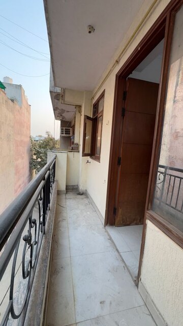 Balcony in 2 BHK Apartment at Palm Residency Chhatarpur, Rajpur Khurd Extension – for Rent