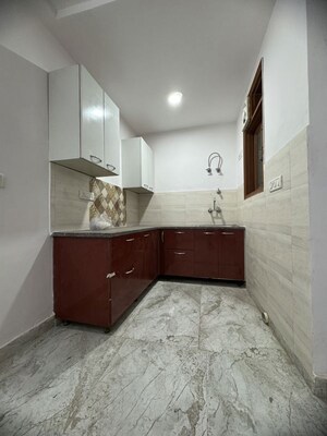 Kitchen in 2 BHK Builder Floor at Palm Residency Chhatarpur, Rajpur Khurd Extension – for Rent