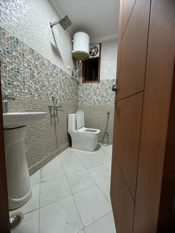 Bathroom in 2 BHK Builder Floor at Palm Residency Chhatarpur, Rajpur Khurd Extension – for Rent