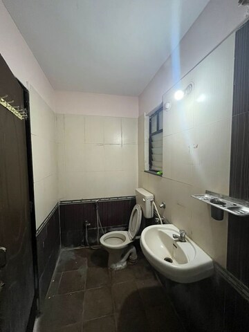 Bathroom in 2 BHK Apartment at Satyam Shivam Sundaram, Manjri Budruk – for Rent