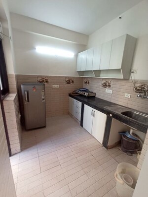Kitchen in 2 BHK Apartment at Urbtech Xaviers, Sector 168 – for Rent