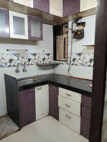 Kitchen in 2 BHK Apartment at Royal Complex, Malad East – for Sale