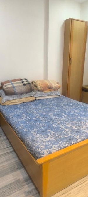 Bedroom in 2 BHK Apartment at Kumar Harshvardhan CHS, Andheri West – for Rent