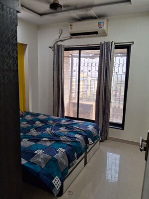 Bedroom in 2 BHK Apartment at Agarwal Vrindavan Gardens, Nalasopara East – for Rent