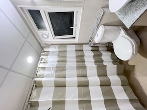 Kitchen in 2 BHK Apartment at Bhartiya Nikoo Homes Phase 2, Thanisandra Main Road – for Rent