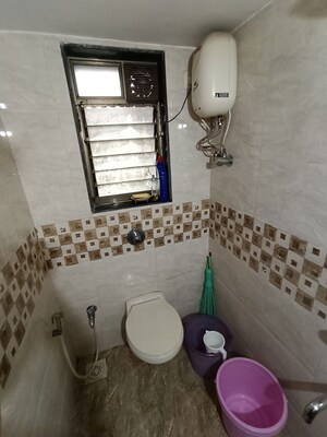 Bathroom in 2 BHK Apartment at Ankur Building, Malad West – for Rent