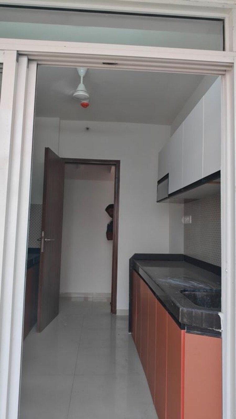 Kitchen, lodha-amara 3 Bedroom 955 Sq.Ft. Apartment In Kolshet Road Thane 9946712